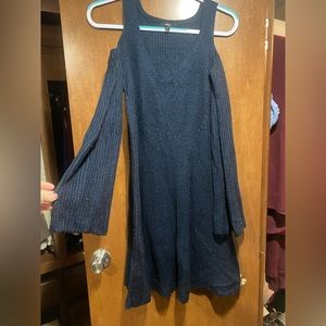 Navy Blue sweater with bell bottom and small bell sleeves. Open shoulder design
